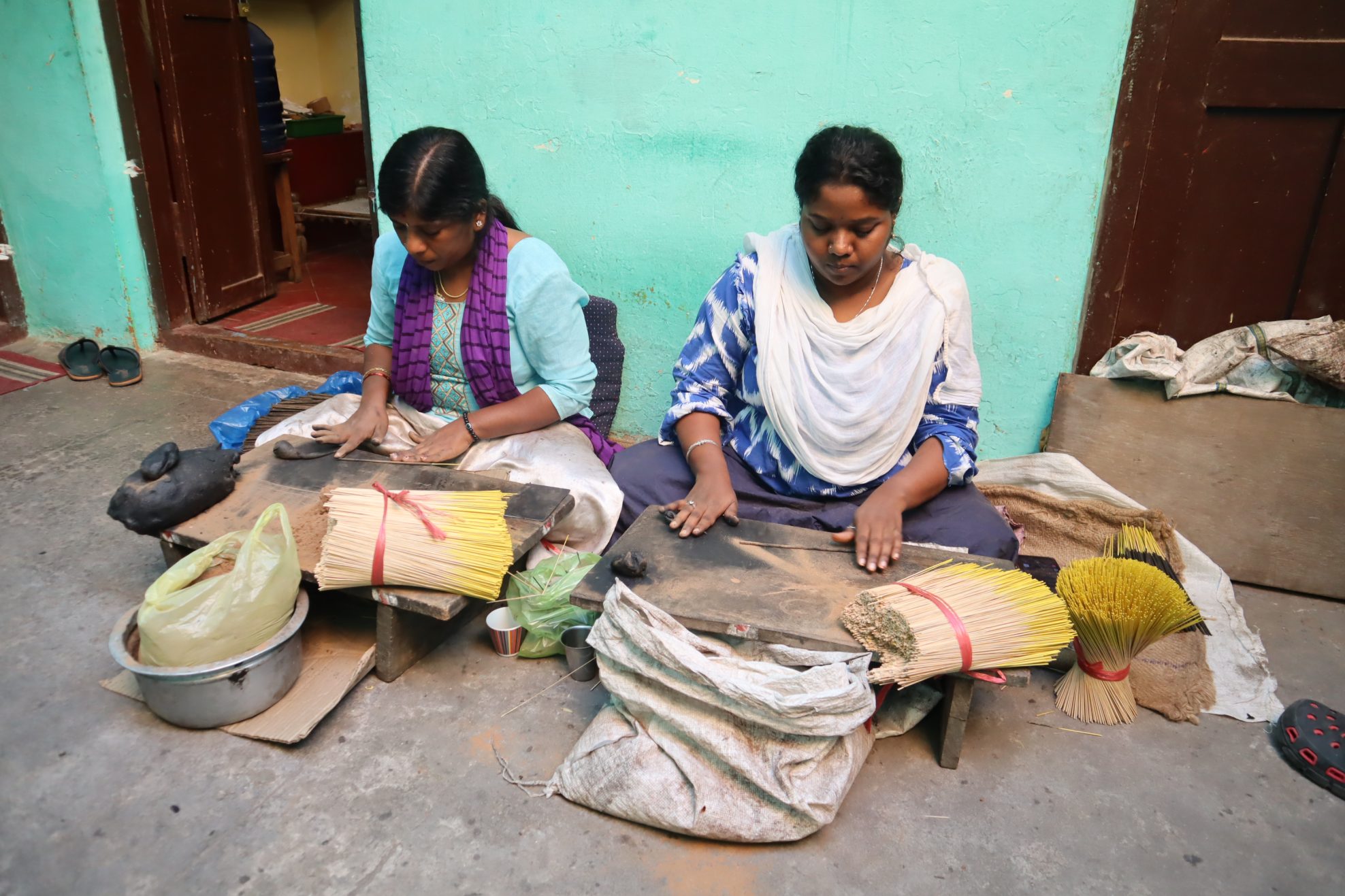 Two women making incense sticks in Mysore, India - Sarah Riches
